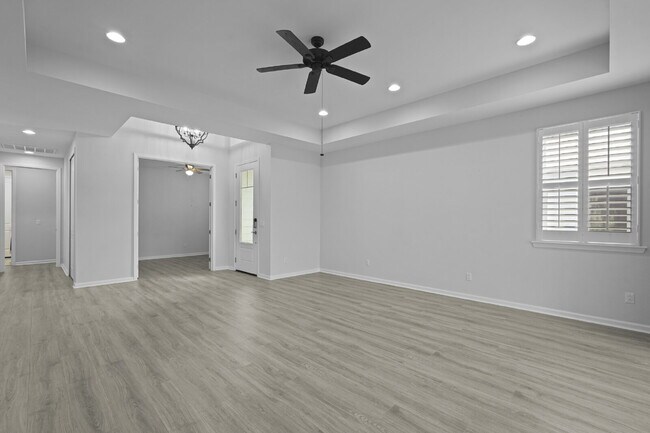 Building Photo - "Charming 2-Bedroom Retreat with 2 Baths and Den - 1558 Sq. Ft. of Comfort in Latitude Margaritav...