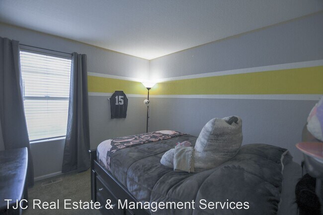 Building Photo - 4 br, 3 bath House - 6458 Trappers Trail Ave