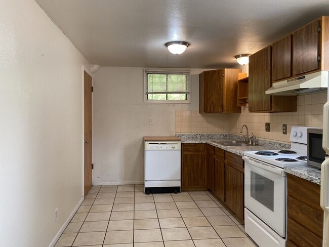 Building Photo - STUDENTS WELCOME! Ranch Home w/ Finished Basement, Fenced Yard and Two Kitchens