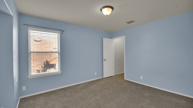 Building Photo - Spacious Buda Rental with Open Layout & Garage