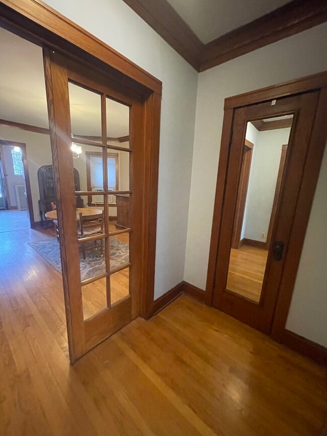 Front Hallway foyer with coat closet - 5735 N Washtenaw Ave