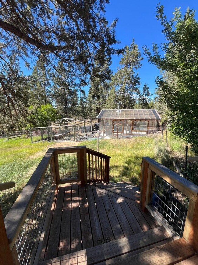 Building Photo - Custom Rustic 4-Bdr on beautiful 5 acres with Greenhouse in Sisters!