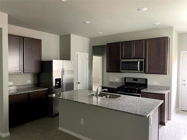 Building Photo - 25654 Northpark Palm Dr