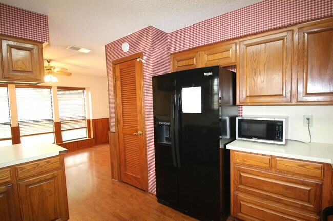 Building Photo - Corner Lot Charmer Off Chapel Creek | 4BR/2BA with Fireplace, Garden Tub & Fenced Backyard
