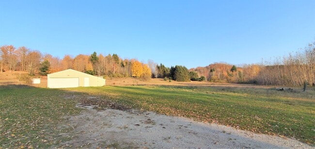 Building Photo - Renovated Farmhouse, 30+ Acres with Pole Barn!