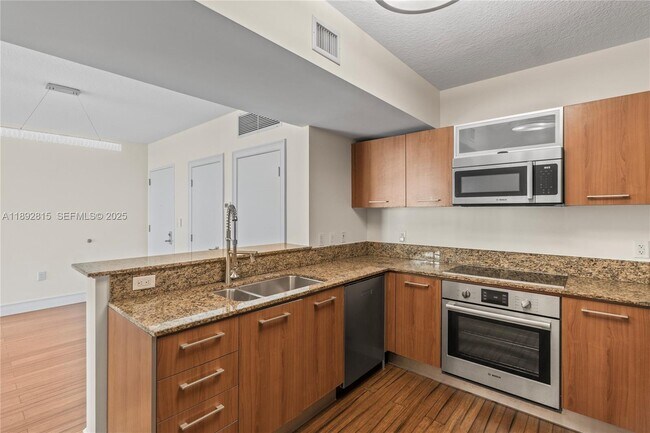 Building Photo - 9055 SW 73rd Ct