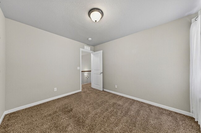 Building Photo - Upgraded 4-Bedroom Corner Lot Home with Mountain Views