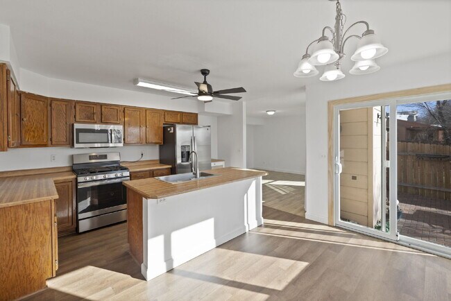 Building Photo - Spacious 6-Bedroom / 3.5-Bath Home — Great Location + Solar Savings!