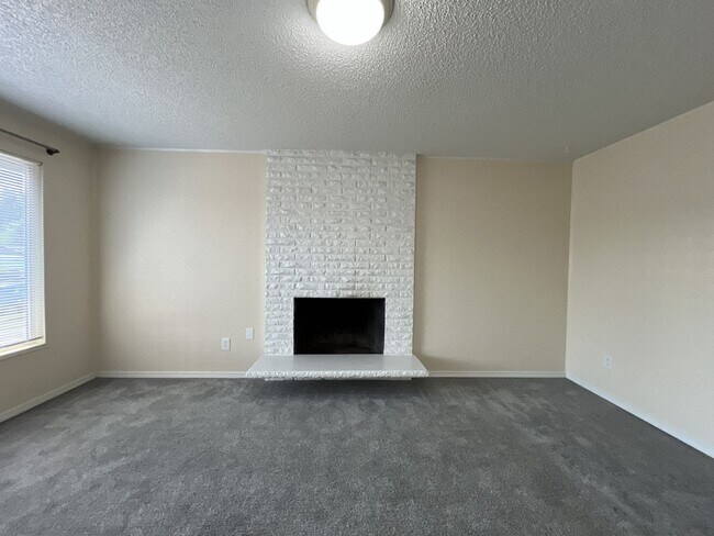 Building Photo - Charming Ranch Home with Sunroom or 4th Bedroom, Two-Car Garage and Fenced Backyard