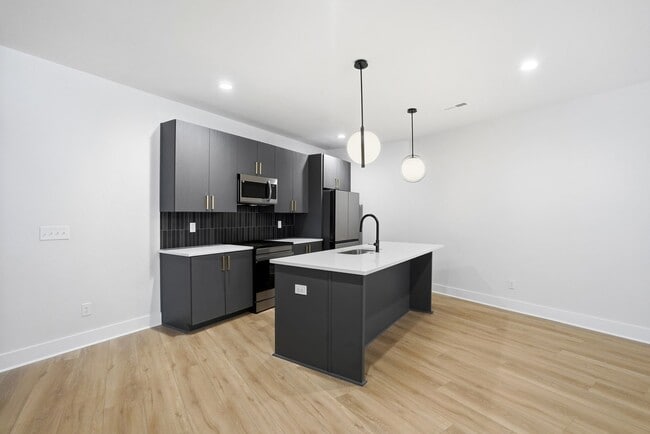 Building Photo - Bright, Open & Exceptionally Large—Your Ideal 2-Story Townhome