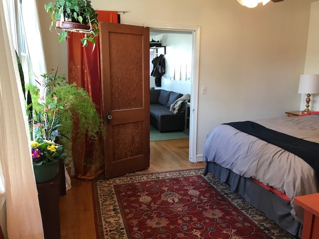 (old photo) middle room door open to living room - 1417 West 37th Street