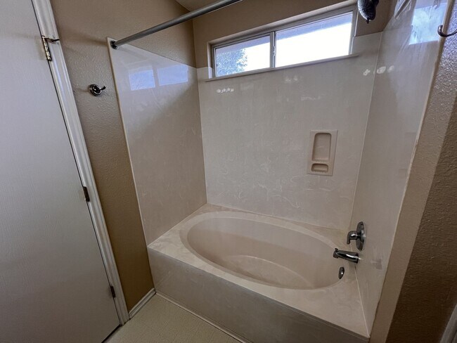 Building Photo - Generous Outdoor Space & Lawn Care Included!