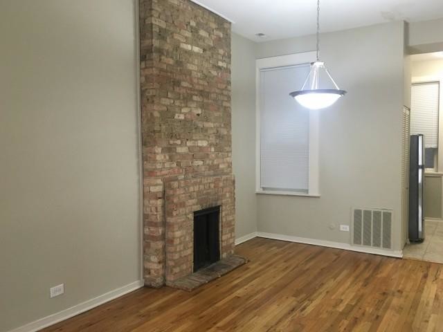 Exposed Brick Fireplace - 2300 N Clark