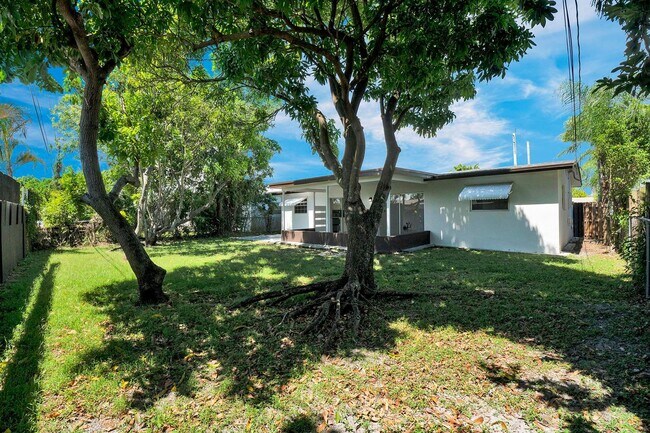 Building Photo - Sunrise Gem: Updated 2-Bed, 2-Bath with Garage Parking