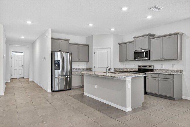 Building Photo - 4 Bedroom in Gated Community!