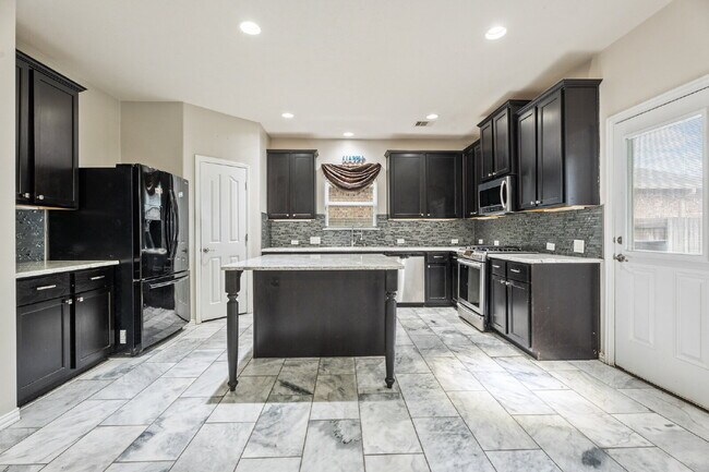 Building Photo - "Charming 4-Bed Home with Elegant Granite Touches & 2.5 Baths!"