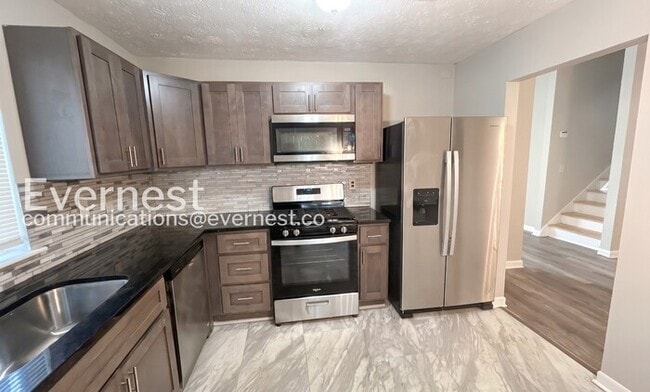 Building Photo - 3 Bed/2 Bath Spacious Home with Modern Features and Garage Parking! / Available Now!