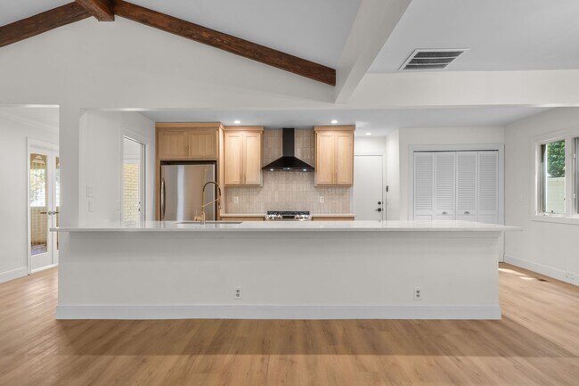 Building Photo - Totally renovated open concept with vaulted ceilings
