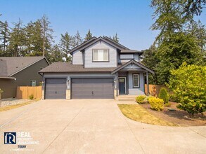Building Photo - Easy JBLM Commute Like-New 4BR Home with 3-Car Garage & Bonus Office