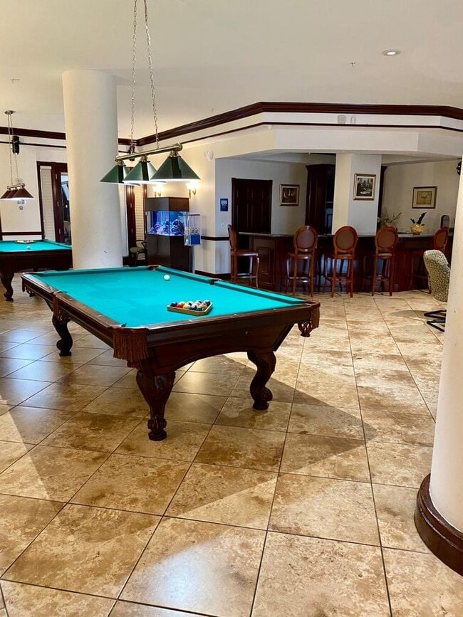 Building Photo - Rare 2/2 Corner Penthouse with Panoramic Lagoon Views from Every Room – Available Now!