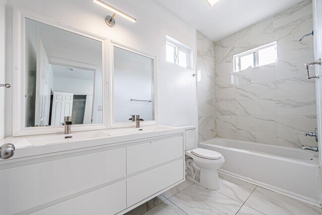 Building Photo - Spacious 4-Bedroom, 3-Bath Home – Modern Upgrades & Parking Included