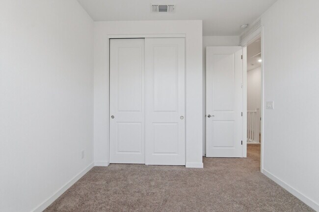 Building Photo - Experience refined living in this beautifully appointed 3-bedroom, 2.5-bathroom townhome spanning...