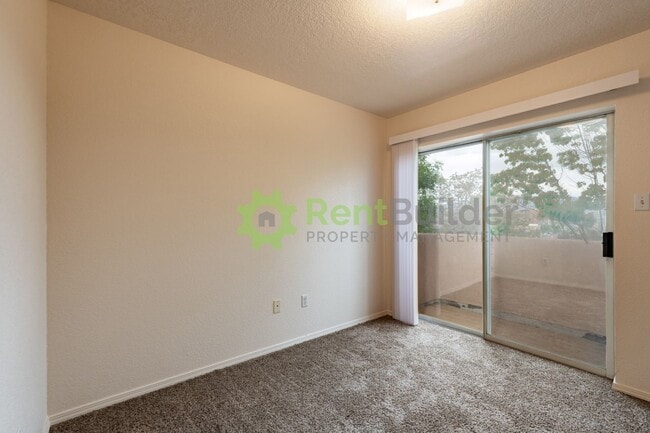 Building Photo - NEWLY UPGRADED CARPET, PAINT AND WINDOW BLINDS
