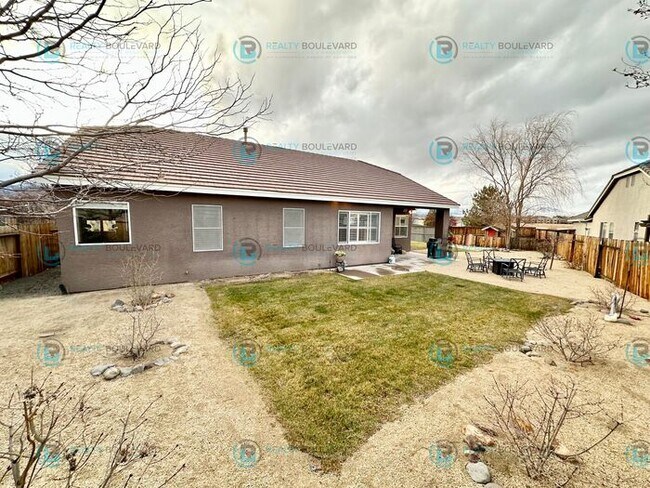 Building Photo - Open Kitchen, Expansive Living, and Covered Patio in Tranquil South Reno Near Trails, Parks & Sho...