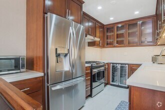 Building Photo - Renovated three-bedroom, three-bath 2-stor...