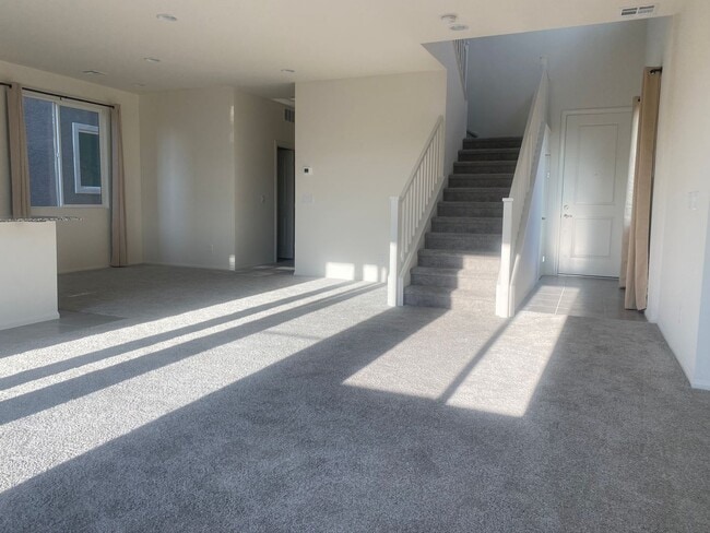 Building Photo - brand-new with two car garages, four bedro...