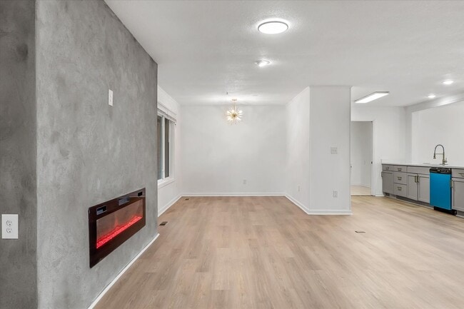 Building Photo - 4BR/3BA Updated Home – Quiet Cove + Fenced Yard!