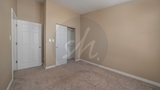 Building Photo - Spacious 3BR Townhome with 2-Car Garage & Private Covered Balcony