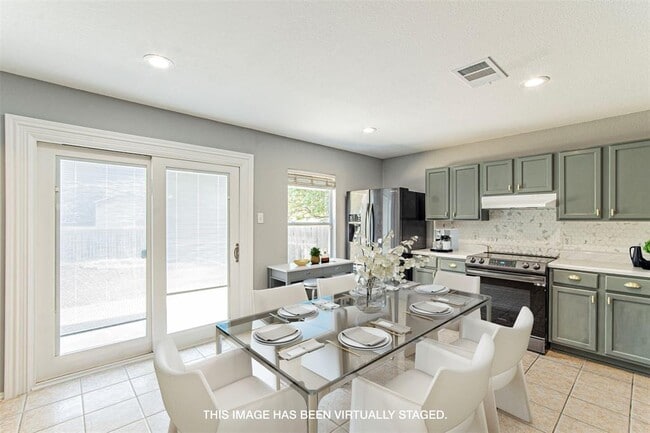 Building Photo - 10923 Menchaca Rd