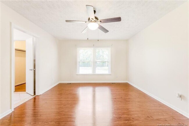 Building Photo - 6837 Woodmark Dr