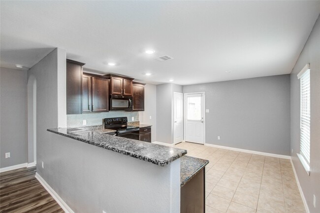Building Photo - 6222 El Topacio Dr