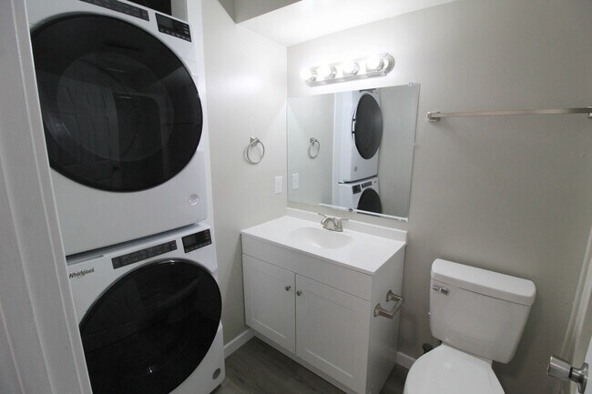 Building Photo - Stunning Fully Remodeled 3BR Condo at Madison Manor – Available This July!