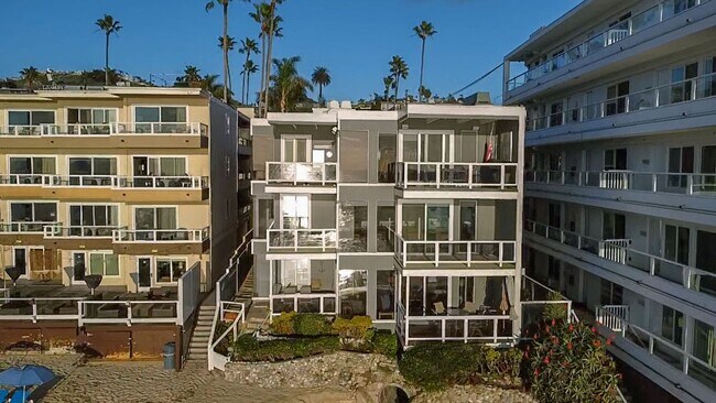 Building Photo - Stunning Ocean Front Oasis! 3 bedroom 2 bath condo with private steps to beach!