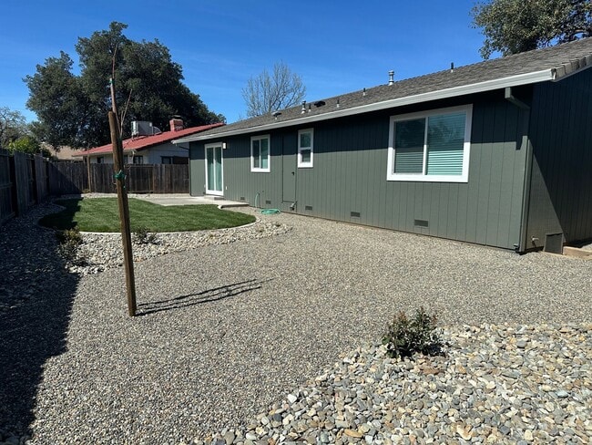 Building Photo - Updated Home with Island Kitchen, LVP Flooring, and Yard Care Included!