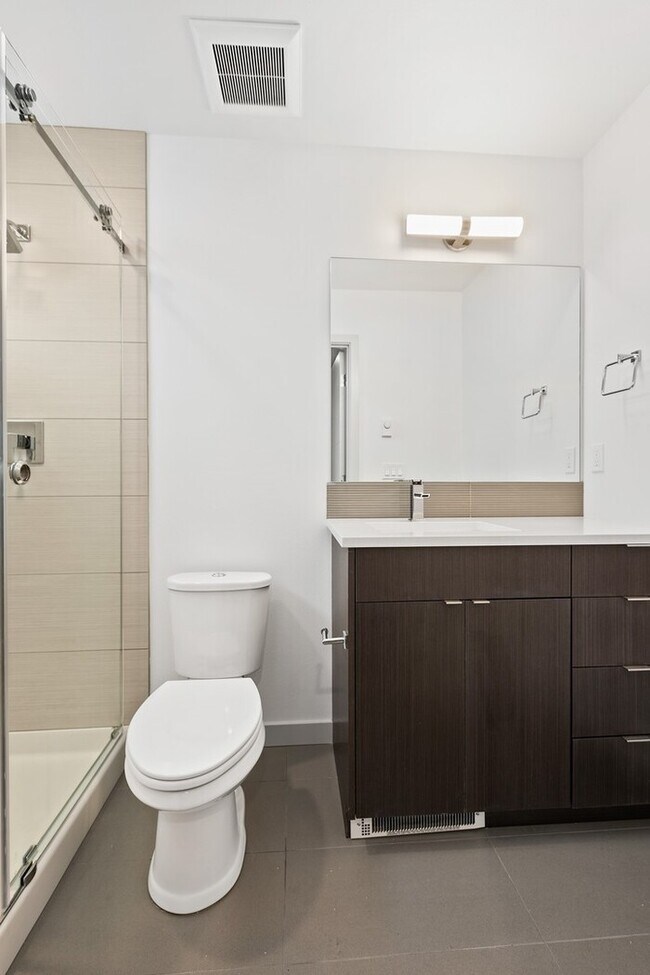 Building Photo - Impeccable Greenwood Townhome with Air Con...
