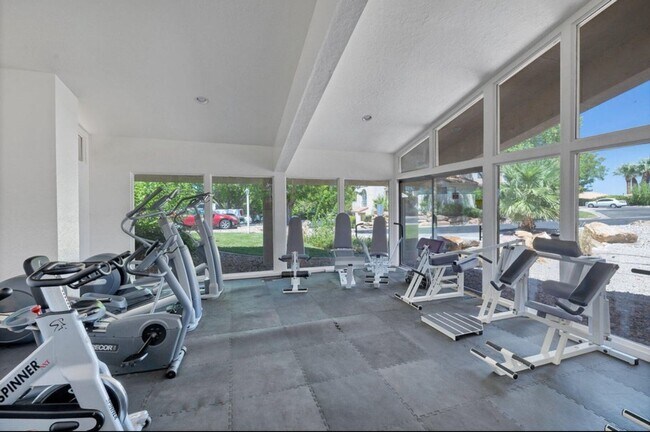 Building Photo - Recently updated condo with gym, pool, and...