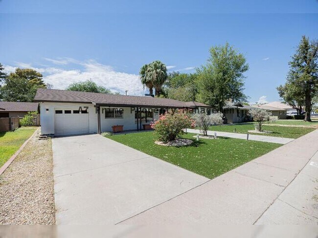 Building Photo - 6828 N 10th Ave