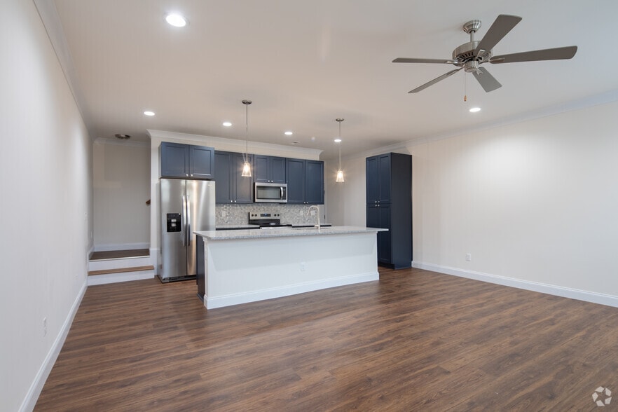 3BR, 2.5BA - 1,512SF - Living Room - The Arbors