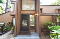Building Photo - Second floor condo 2/1.5 located at the Fa...