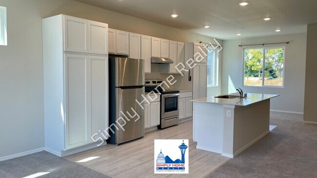 Building Photo - Step Inside to a Townhome Made for Easy Living!