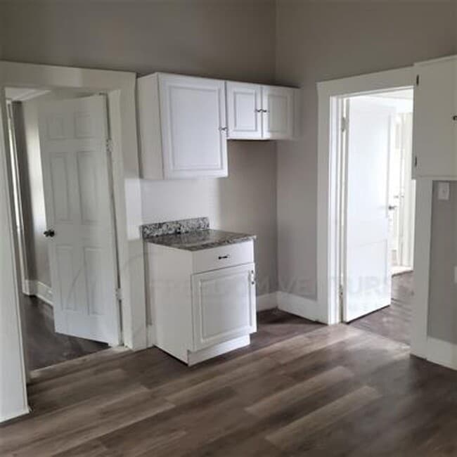 Building Photo - Spacious 3BR/2BA Rental with Hardwood Floors & Updated Living Room