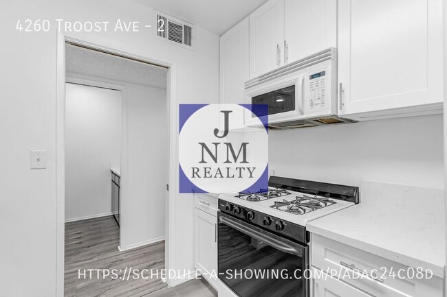 Building Photo - Beautiful 1 Bedroom + 1 Bath + Private Patio