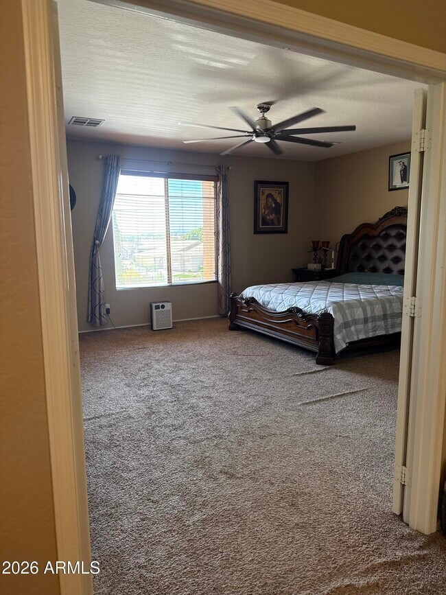 Building Photo - 3928 W Range Mule Dr
