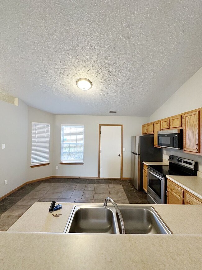 Building Photo - STUNNING Pond Views in this 2-Bed, 2-Bath Duplex