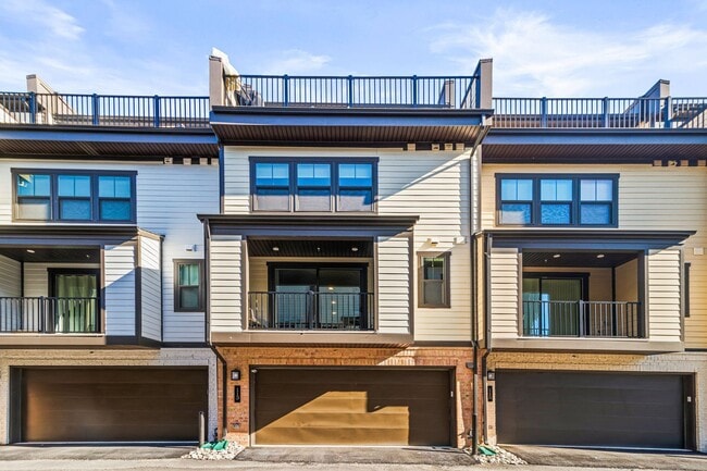 Building Photo - Your new home awaits you! Luxury Townhouse...