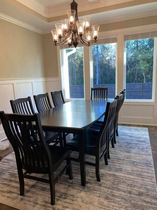 Building Photo - Spacious 4BR/3BA Creekside West Home with Screened Porch, Fenced Yard & 3-Car Garage